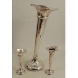 Three hallmarked silver trumpet vases, all af