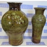 L Stockley, Weymouth, two pottery vases, one decroated with a band of flowers the other with