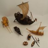 An early 20th century tortoiseshell model, of a ship with sails, height 10.5ins, together with other