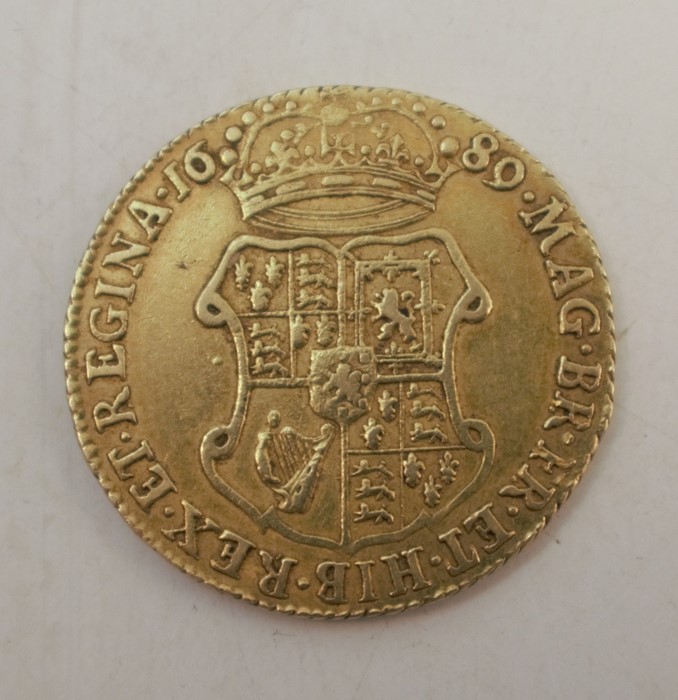 A William and Mary 1689 gold guinea, with elephant and castle below the double portraits