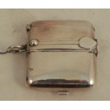 A silver novelty case, with hinged compartment for half and full sovereigns, a cigar cutter and
