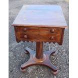 A 19th century mahogany side table, with hinged flap to the back, fitted with two drawers, the top