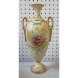 A Royal Worcester blush ivory two handled vase, with octagonal neck, decorated with flowers and