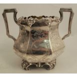 A Victorian silver two handled sugar bowl, with octagonal baluster body and engraved decoration,