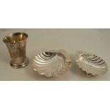 Two silver shell butter dishes, one engraved with an initial, Sheffield 1898 and London 1902, weight