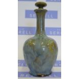 A Royal Doulton bottle vase with stopper, decorated with a mottled glaze and small stylised