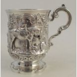 A Victorian silver christening cup, embossed with a pony, child and dog with flowers and scroll,