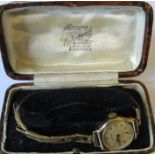 Hirco, a lady’s 9 carat gold mechanical wrist watch on a gilt metal expanding bracelet, cased