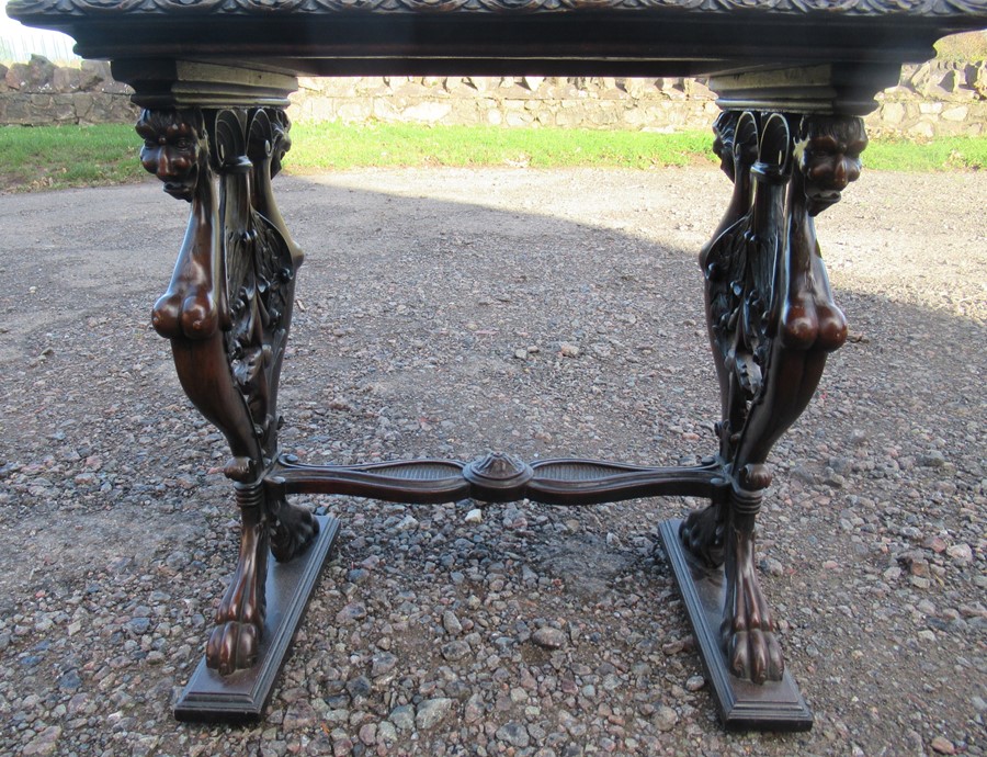 A marble topped mahogany table, the rectangular marble set in to a carved frame, raised on end - Image 3 of 3