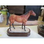 A Royal Worcester model, Red Rum, modelled by Doris Lindner, plinth but no certificateCondition