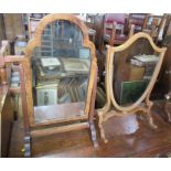 Two mahogany framed dressing table mirrors, heights 23.5ins and 22ins