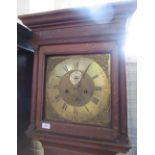 An Antique oak cased long case clock, with brass square dial and subsidiary dials, engraved James