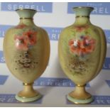 A pair of Grainger and Co Worcester blush ivory vases, decorated to the front with poppies by G H