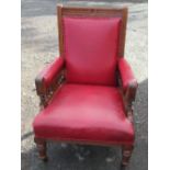 An Edwardian mahogany framed grandfather's chair, with carve and turned decoration