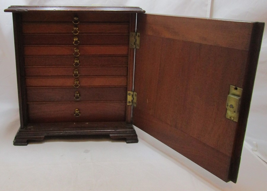 A 19th century mahogany coin cabinet, having a single door opening to reveal nine trays, with - Image 9 of 15
