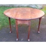 A 19th century mahogany drop leaf table, with swing leg action, raised on pad feet, 42ins x 47ins,