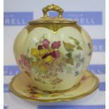 A Royal Worcester blush ivory covered cracker barrel and stand, decorated with flowers, dated