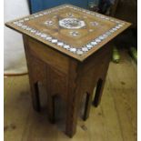 An Eastern square occasional table, the top inlaid with mother of pearl and ebony with Eastern