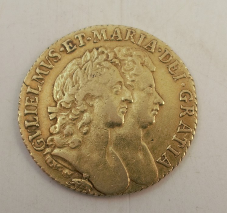 A William and Mary 1689 gold guinea, with elephant and castle below the double portraits - Image 2 of 2