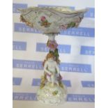 A Dresden porcelain centrepiece, in the form of a pierced basket decorated with flowers and