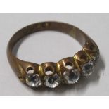 A costume jewellery ring, stamped '15'c, 2.3g gross
