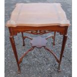 An Art Nouveau mahogany centre table, with inlaid and carved decoration, 22ins x 22ins, height