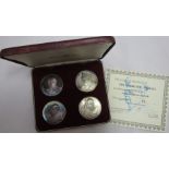 John Pinches, a cased set of four silver The Churchill Medals, with certificate, weight 70g