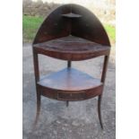 A 19th century mahogany corner wash stand, fitted with a drawer to the lower shelf, height 43ins