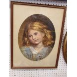 Watercolour, oval portrait of a young girl, head inclined to one side wearing blue smock top, 14 x