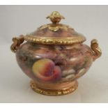 A Royal Worcester covered sugar bowl, decorated with fruit to a mossy background by P Love, dated