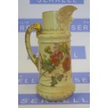 A Royal Worcester blush ivory jug, with mask spout and decorated with flowers, shape number 1366,