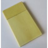 A plain ivory card case, 3.75ins x 2.25ins
