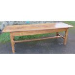 A farmhouse kitchen table, the four plank top with cleated ends, 99ins x 33ins, height 31ins