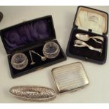 A collection of hallmarked silver, to include a cased pair of silver mounted glass salts, a silver