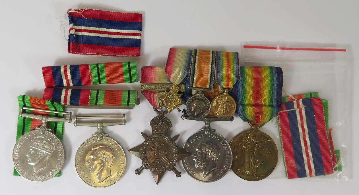 A WWI Three Medal Group awarded to 38768 GNR. E. BAKER. R.A. with 1914 Star with miniatures and