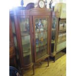 An Edwardian Mahogany and Strung Shape Front Glazed Display Cabinet