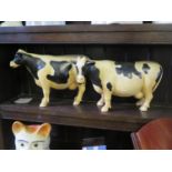 A Pair of Cow Ornaments