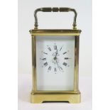 A French Brass Carriage Clock by L'Epée, boxed with guarantee booklet dated 1978, winds and runs