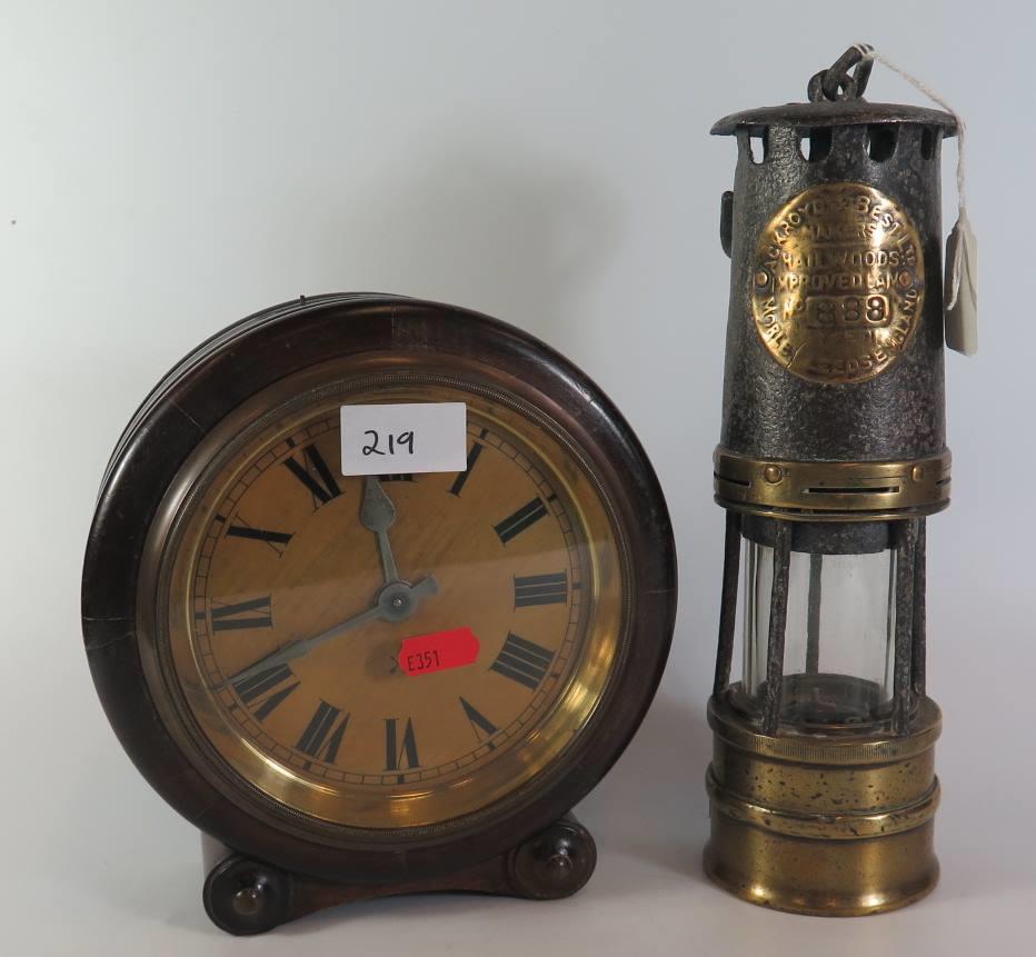 An Ackroyd & Best Ltd. Miner's Safety Lamp, no. 888 and Wurttemberg Clock (not running)