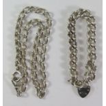An English Sterling Silver Curb Link Bracelet with heart lock clasp and 41cm chain