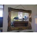 A Gilt Framed Bevel Edged Mirror
