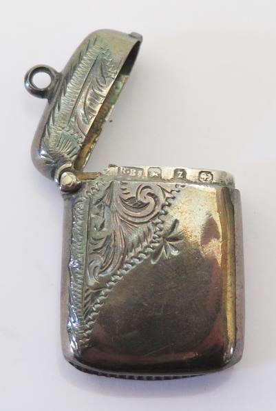 A Small Victorian Silver Vesta Case with chased foliate scroll decoration, Birmingham 1899, - Image 2 of 2