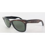 A Pair of Ray-Ban Wayfarer Sunglasses WO529 UWAS