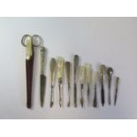 A Collection of Silver and Mother of Pearl Handled Manicure Tools etc.