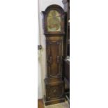 An Oak Cased Grandmother Clock with 8 day chiming movement