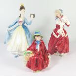 Three Royal Doulton Figurines: HN1492 Christmas Morn, HN2106 Linda and HN2269 Leading Lady (hairline