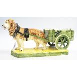 A Royal Dux Ceramic Sculpture of St. Bernard drawing cart