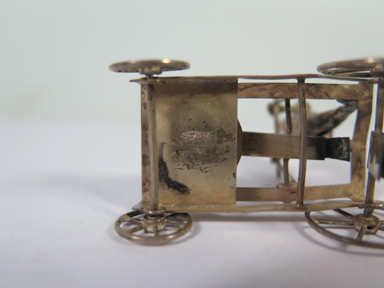 A Hong Kong Silver Miniature of an Articulated Four Wheel Cart with bowl and crushing mechanism - Image 2 of 2