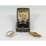 A 15ct Gold and Diamond Brooch 2.2g, damaged 1818 gold and enamel ring 4g and white metal ring