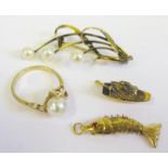 A Selection of 14K Gold Jewellery including articulated fish pendant, boat pendant and pearl